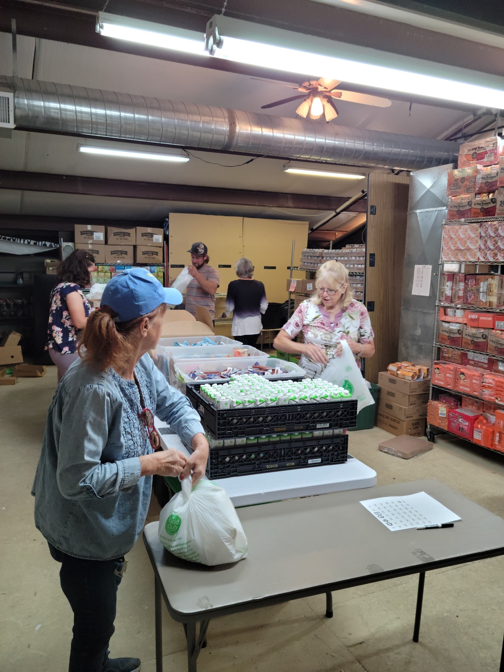 Volunteers making Kid Packs