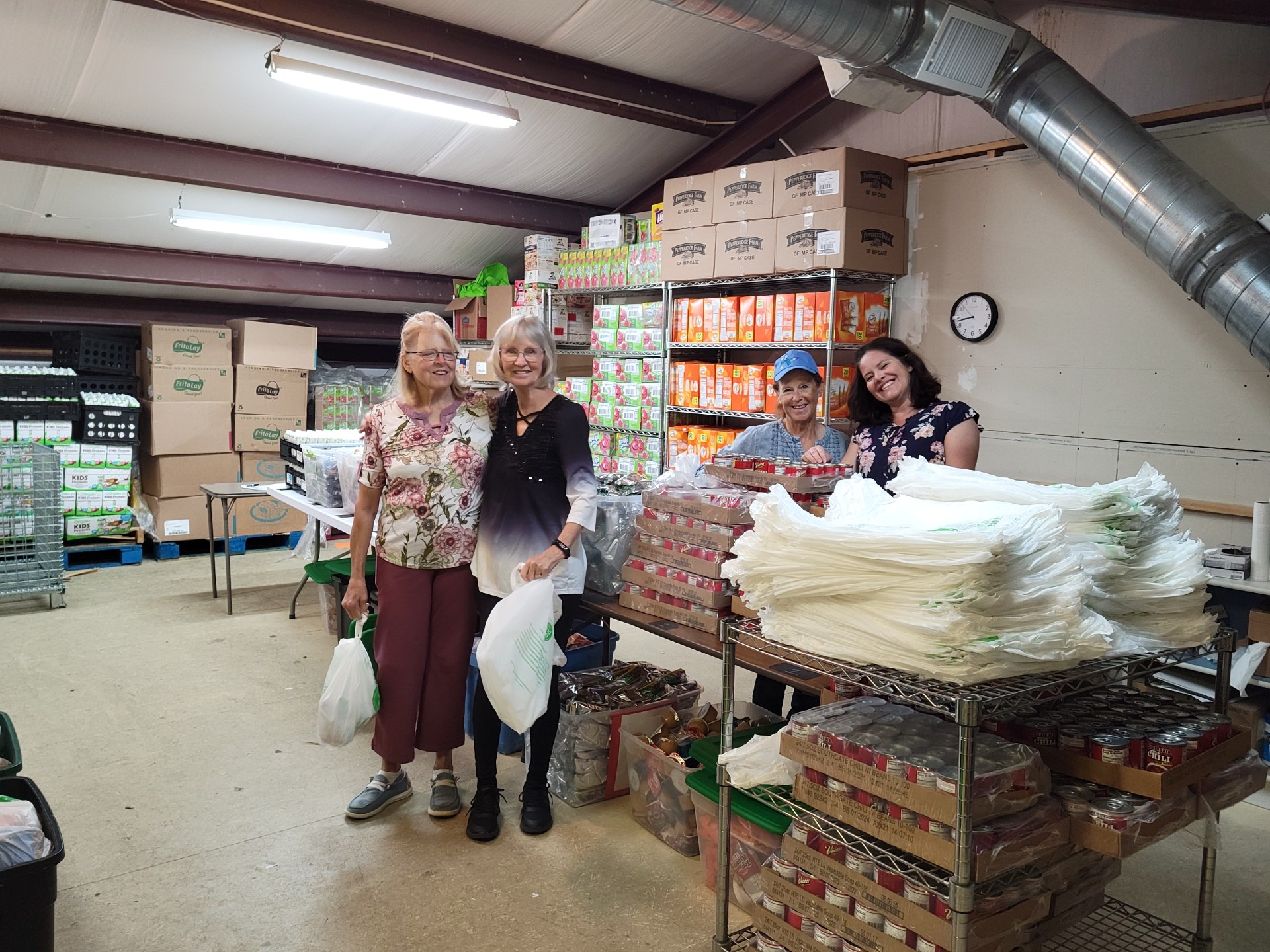 Volunteers getting ready to make Kid Packs