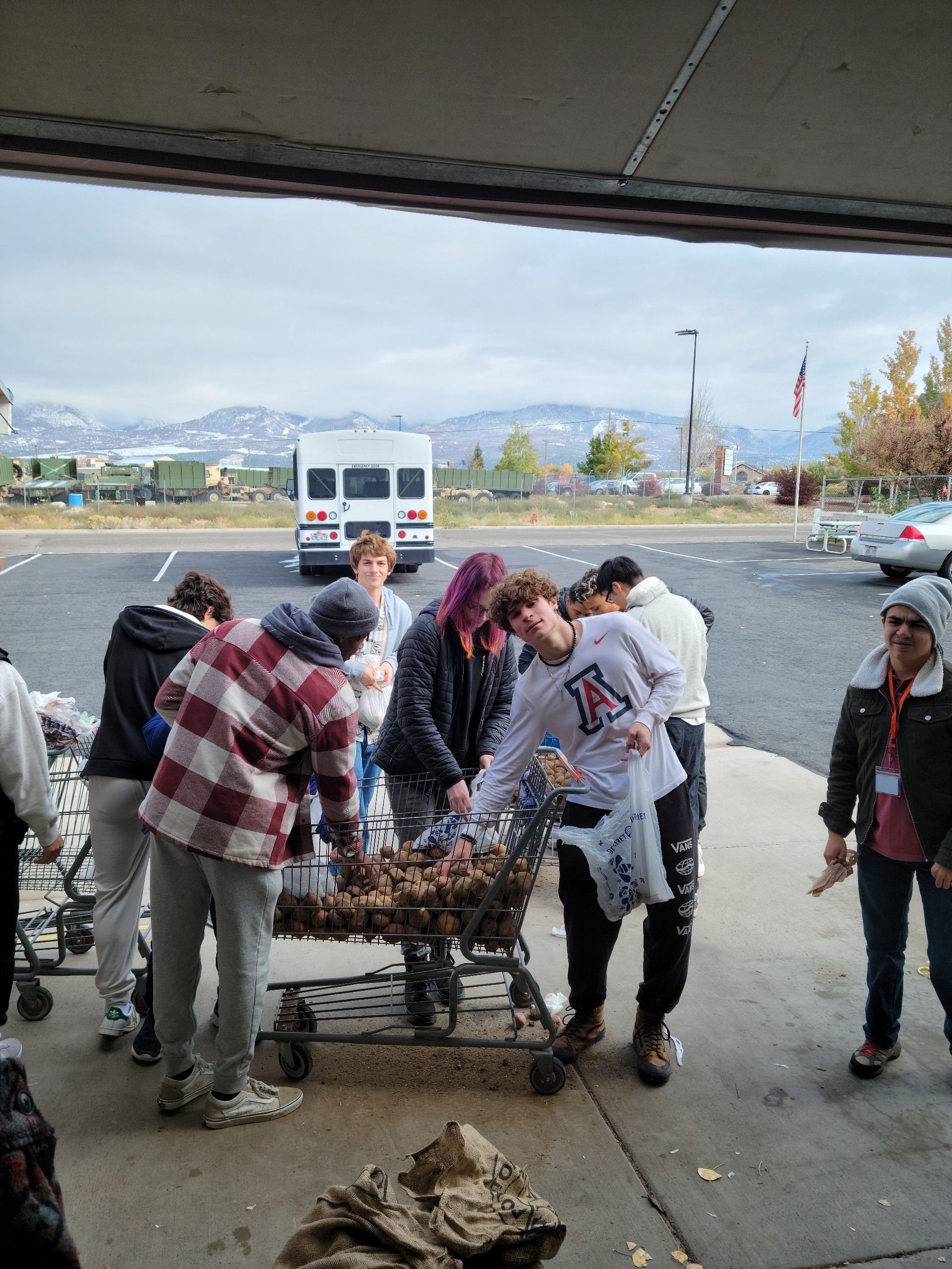 Volunteers sorting potatoes